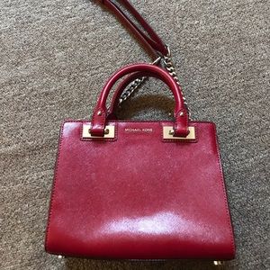 Red Michael Kors handbag